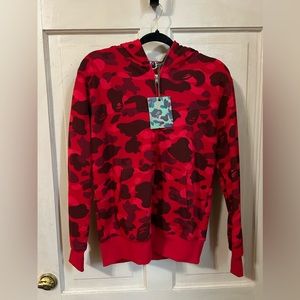 New with tag red Bape Hoodie. Size small men or women.